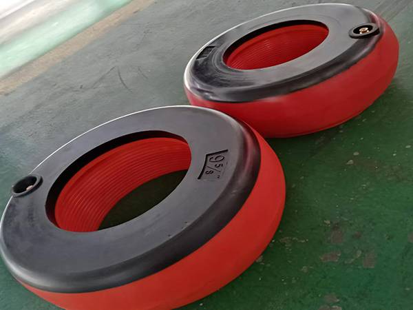 A red integral inflatable thread protector is on the ground.