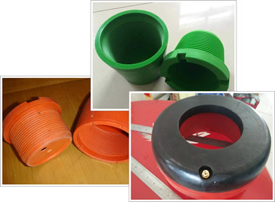 An integral inflatable thread protector and two sets of one-off thread protectors, one is orange and another is green.