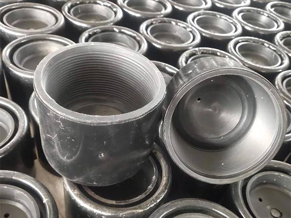 Many one-off thread protectors on ground