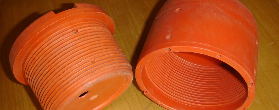 A set of orange one-off thread protector.