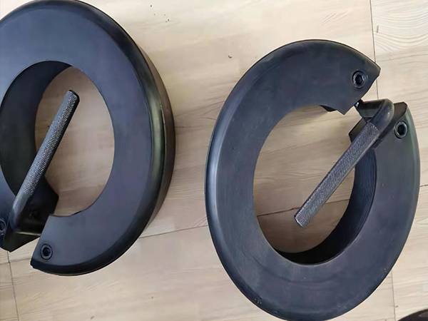 2 black quick release thread protectors on floor